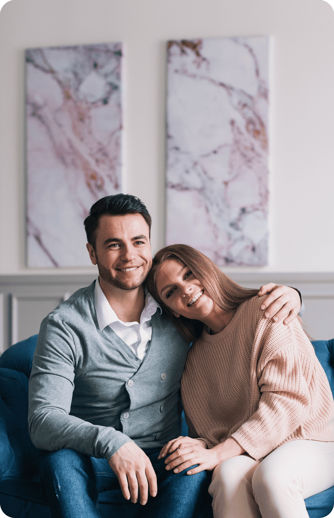 Couple embracing in cozy living room
